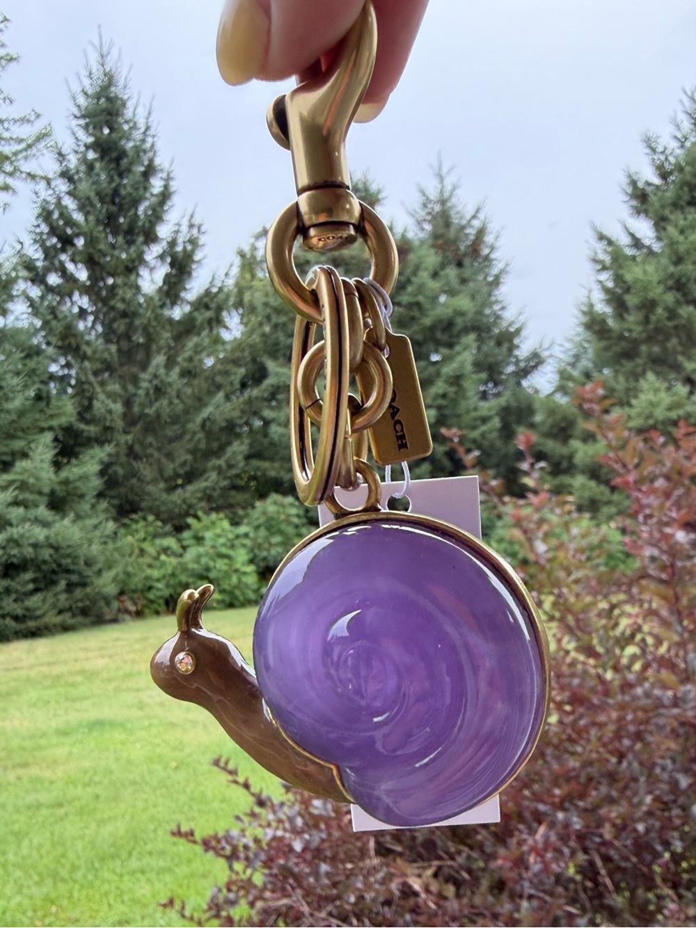 Coach snail bag charm keychain purple gold NWT